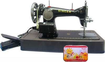 Singer Ladies use Electric Sewing Machine Image